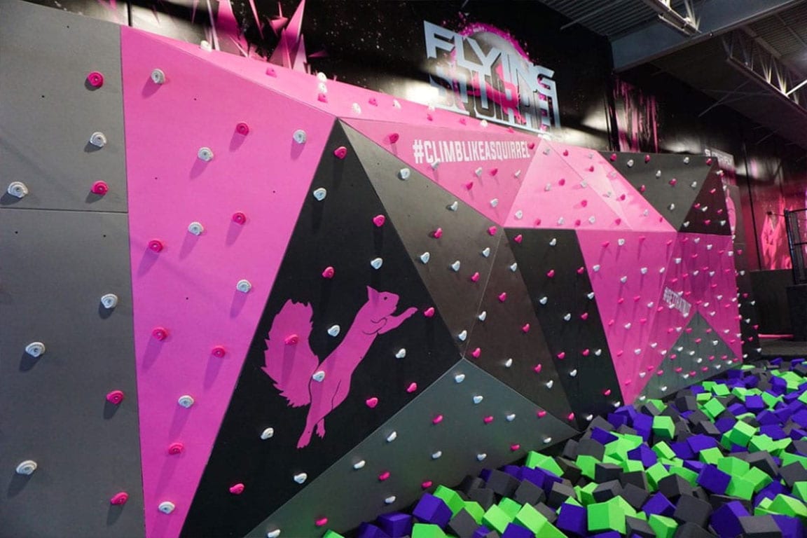 Flying Squirrel Climbing Wall over a Foampit