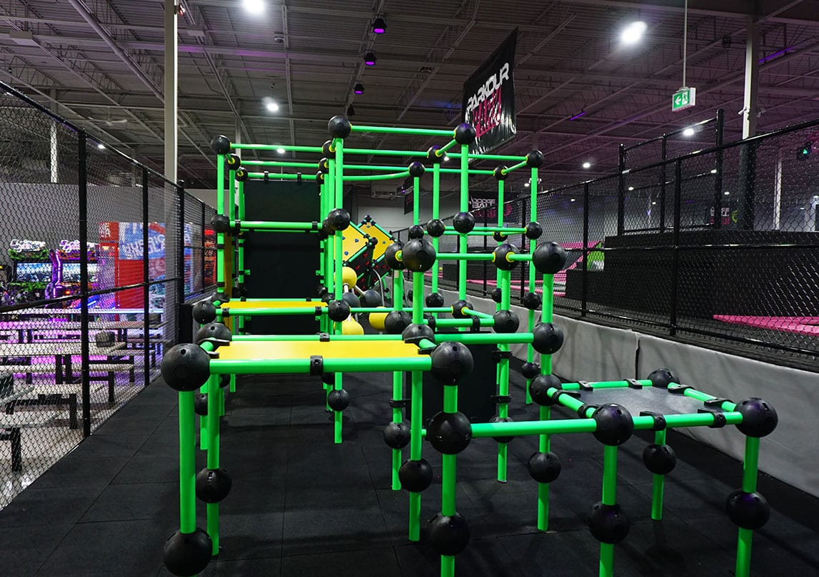A green and yellow parkour course.