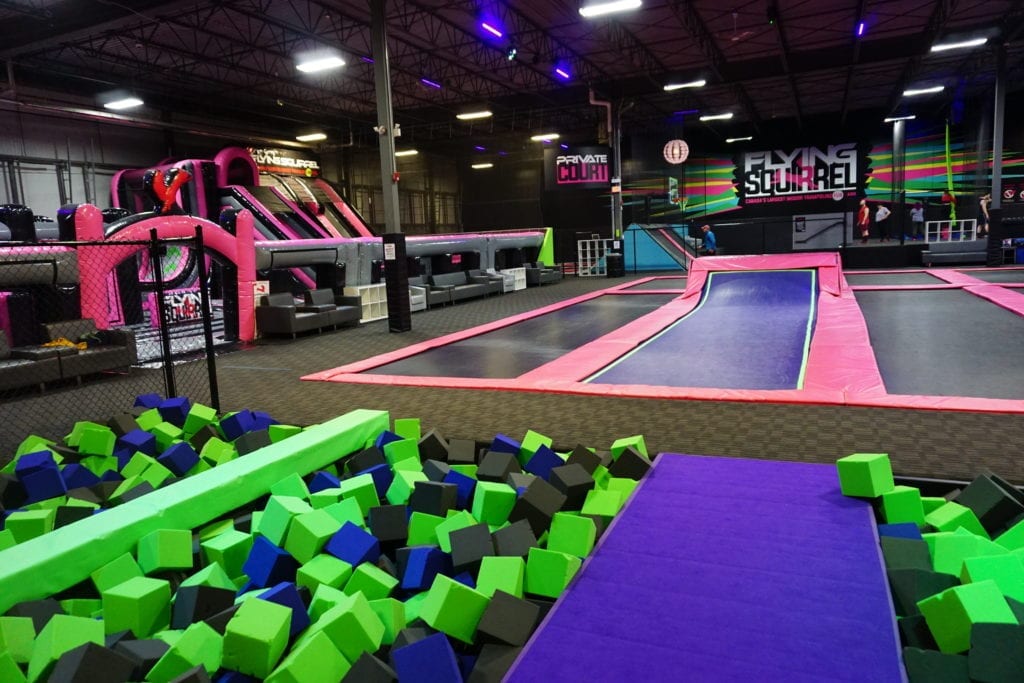 Flying Squirrel Trampoline Court with Inflatable Course in North Calgary
