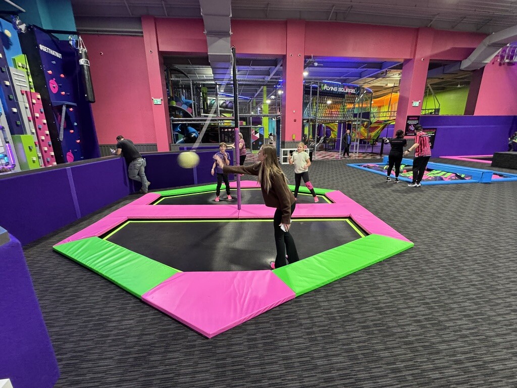 Guest playing trampoline tetherball