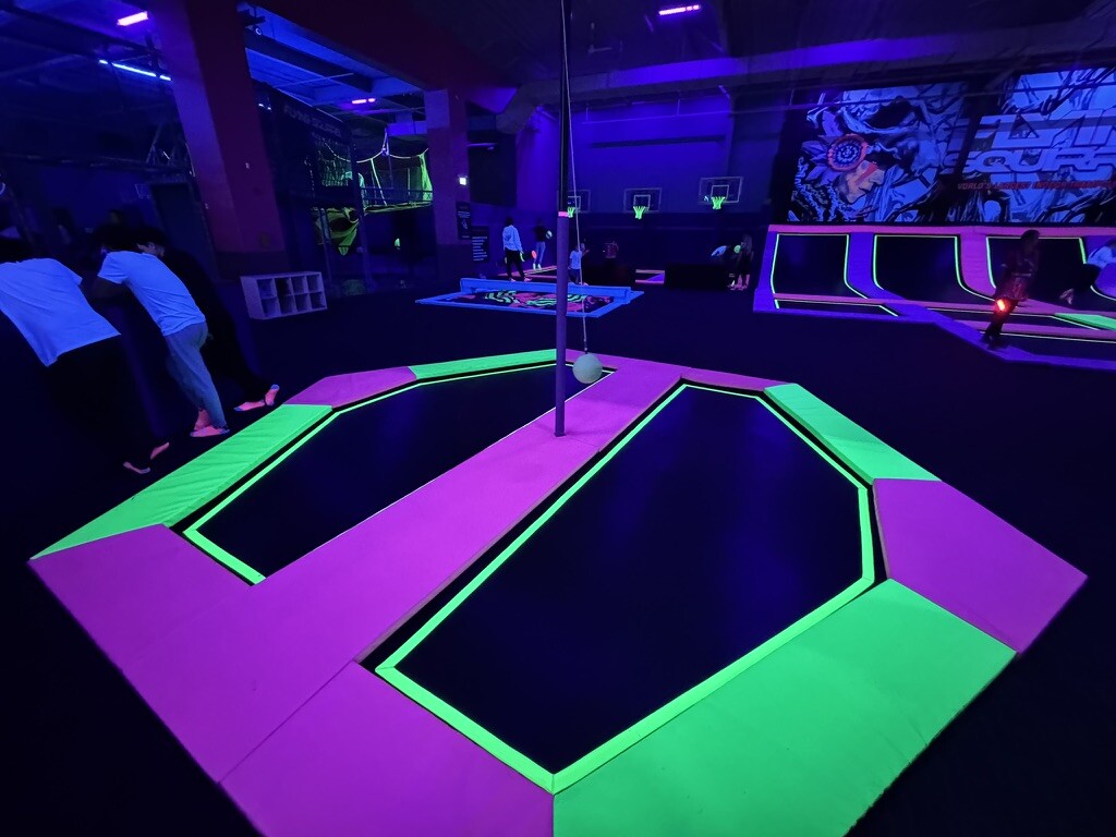Trampoline tetherball court in a family entertainment center