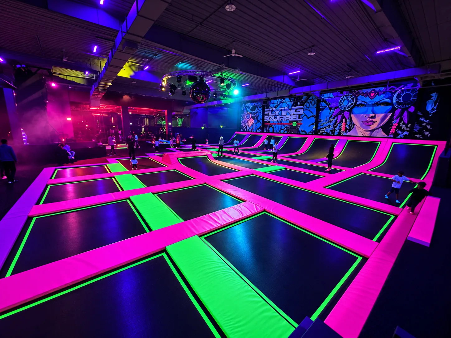 Flying Squirrel freestyle court glowing under UV lighting